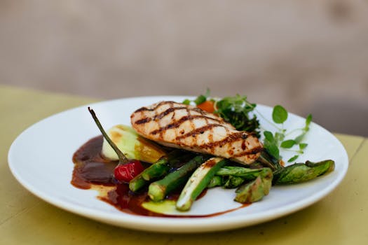 healthy meal at a restaurant with salad and lean protein