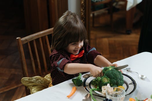 happy kids eating vegetables